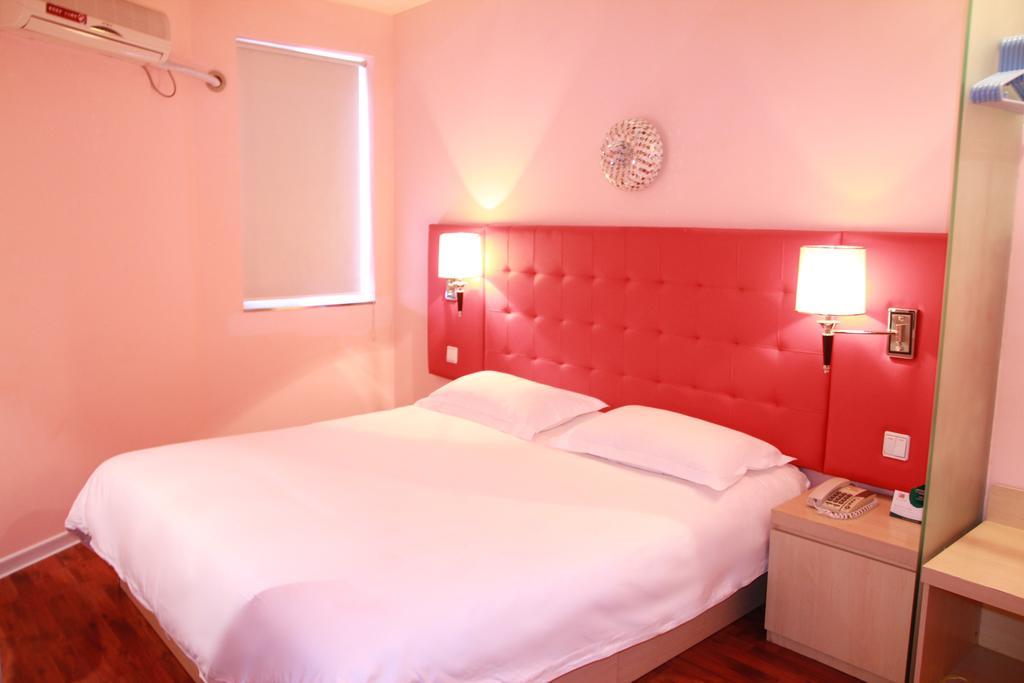 Qingdao Renjia Bussiness Hotel Habitación foto
