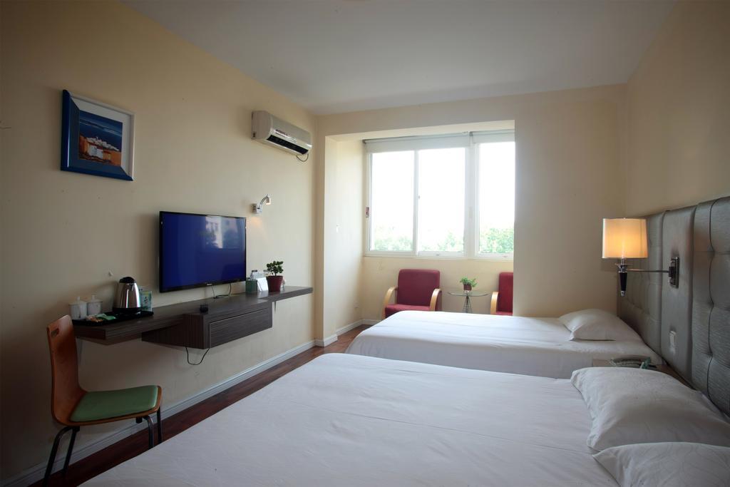 Qingdao Renjia Bussiness Hotel Exterior foto