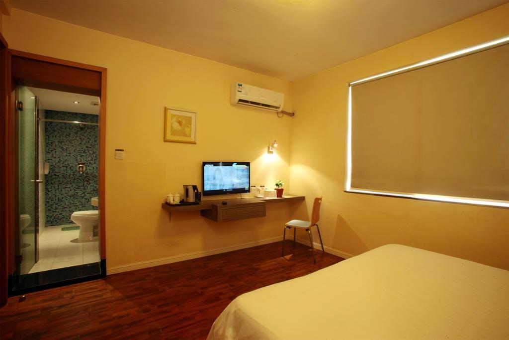 Qingdao Renjia Bussiness Hotel Exterior foto